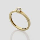 Anillo diamante de compromiso. Joya de oro amarillo y diamante creada por Comin Joieria Creativa