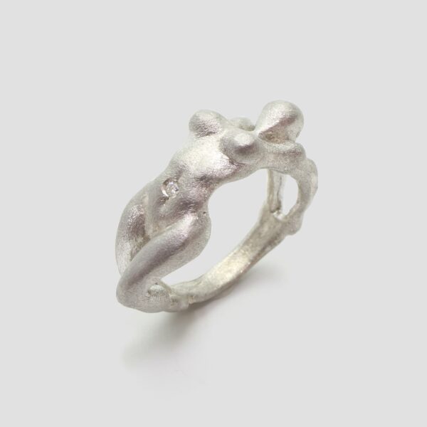 Anell diamant • cos dona