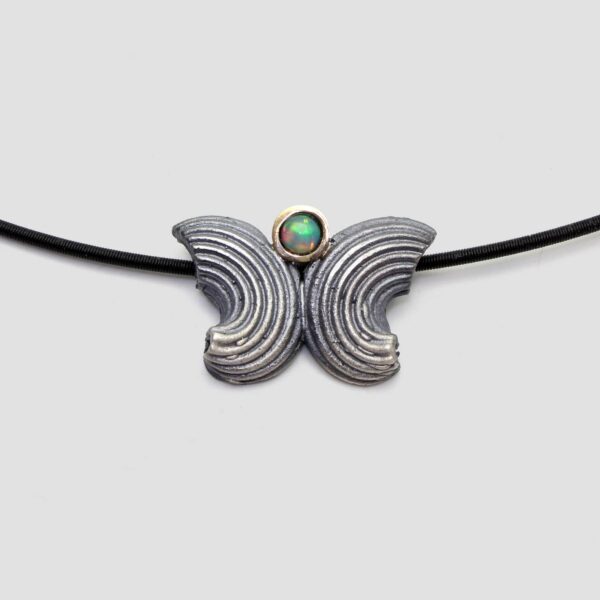 Penjoll òpal • Galets solidaris