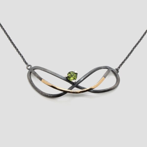 Collar peridot infinit