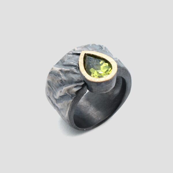 Anell peridot