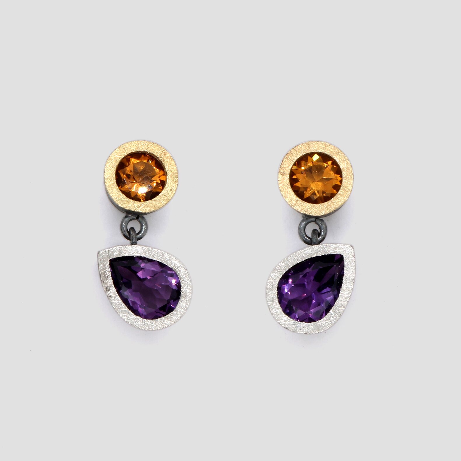 Arracades citrins i ametistes